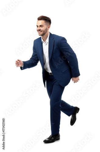 Handsome running businessma...