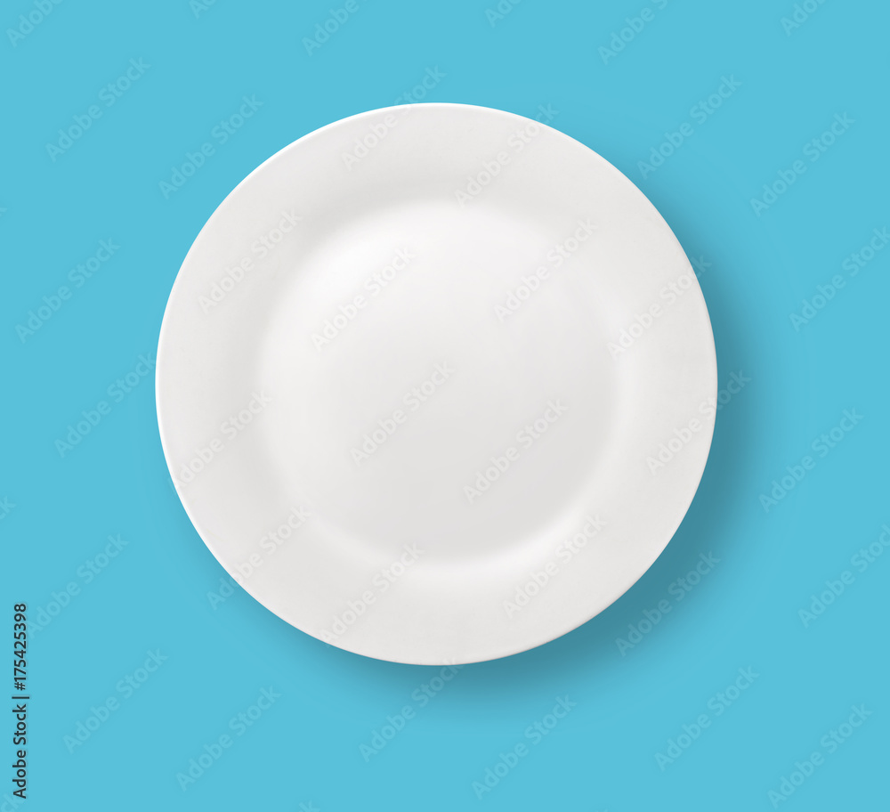 Blank white dinner plate on blue background. Blank white dinner plate on blue background.