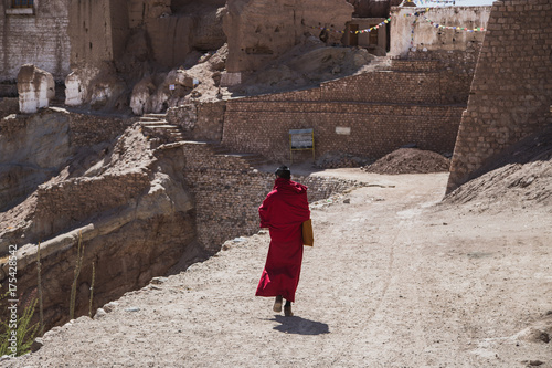 LADAKH, INDIA - 2 MAY 2016: An unidentified Buddhist monk standing in a beautiful temple in Ladakh , India