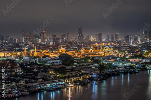 Wat Phra Kaew  Temple of the Emerald Buddha beside Chao Phraya river at night time in Bangkok  Thailand. HDR photo.