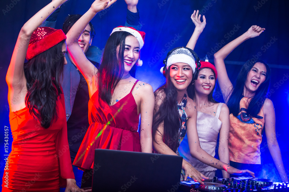 Fototapeta premium Group of young Asian Women Dancing Together in Nightcub. Woman Dancing with Attractives Smiling. People with Party Concept.