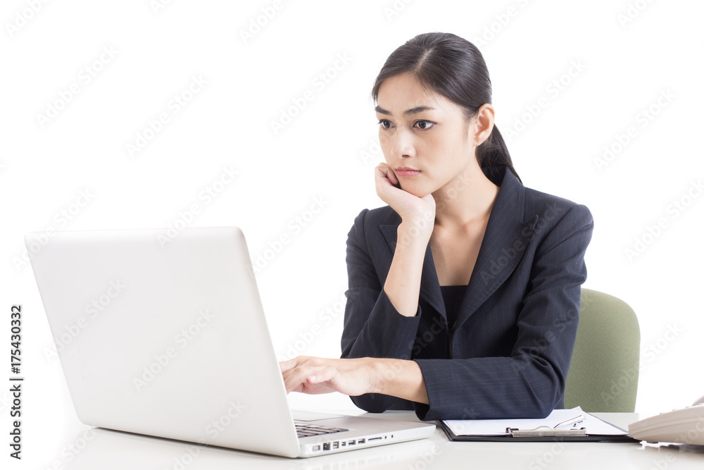 Woman looking in Computer with Serious Emotion, Isolated on white background, woman working concept. Woman looking in Computer with Serious Emotion, Isolated on white background, woman working concept.