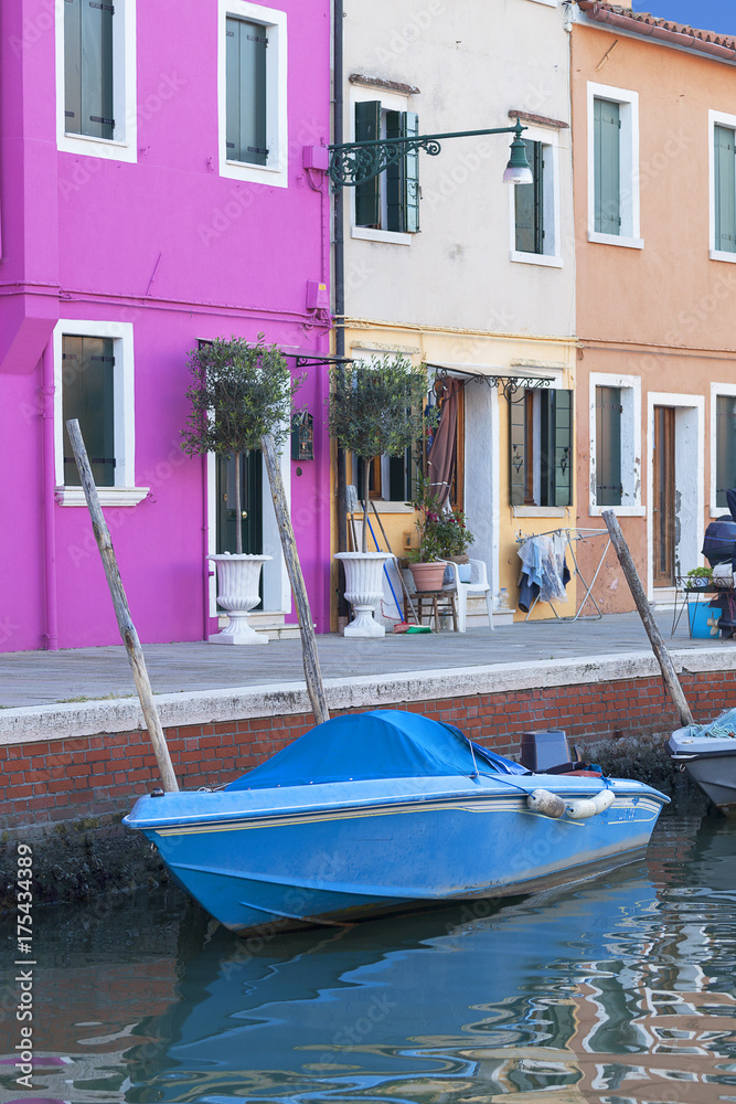 Colorful small, brightly painted houses on the island of Burano, Venice, Italy Colorful small, brightly painted houses on the island of Burano, Venice, Italy