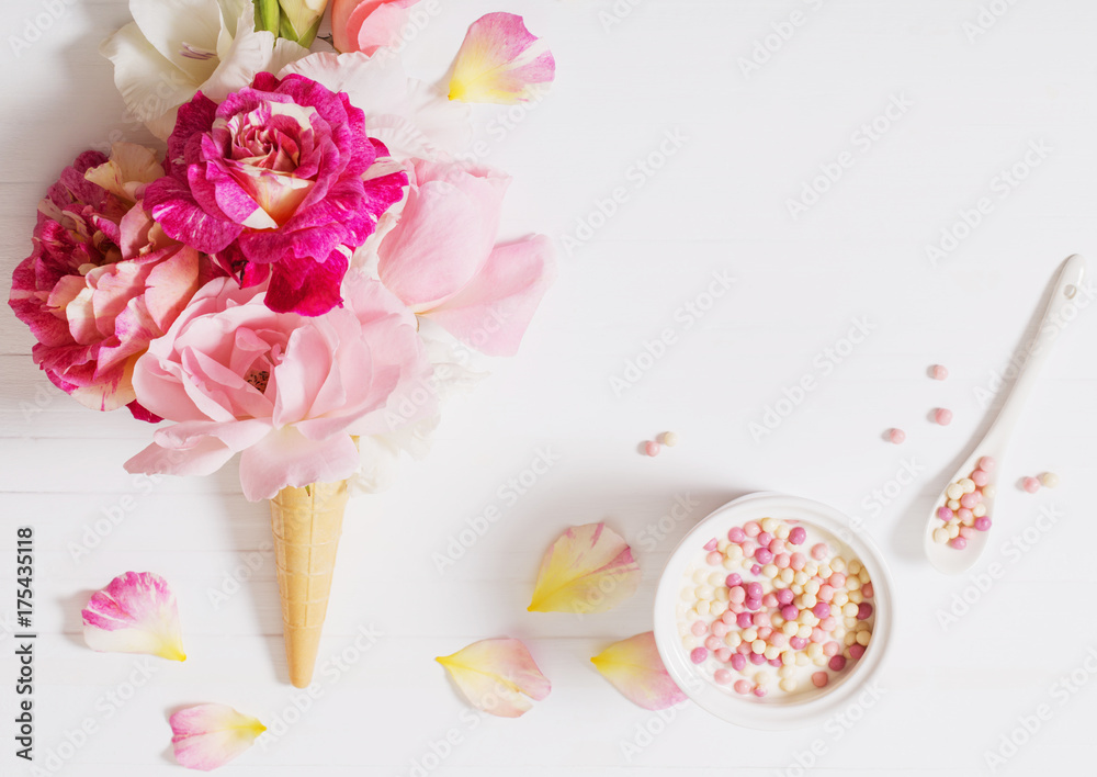 Plakat flowers in waffle cone on wooden background