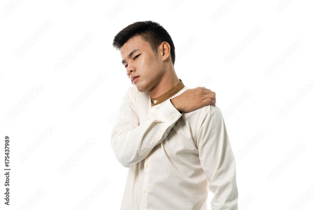 Handsome asian reception man having a shoulder pain portrait studio on white background Handsome asian reception man having a shoulder pain portrait studio on white background