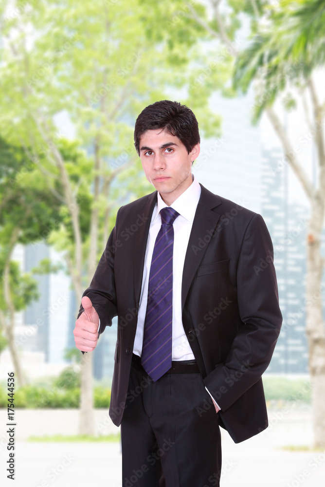 Businessman in suit over singapore city Businessman in suit over singapore city