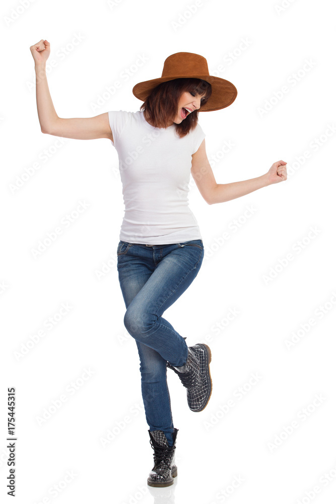 Excited And Happy Young Girl Dancing On One Leg Excited And Happy Young Girl Dancing On One Leg