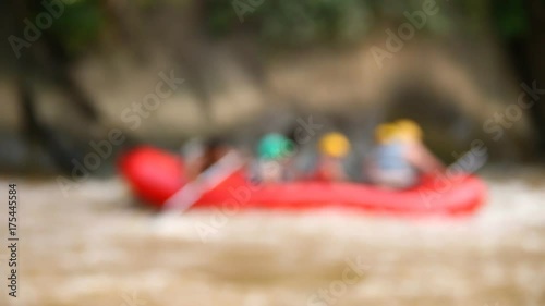 Blurred  Group of tourist  rafting on river in chiangmai Thailand photo