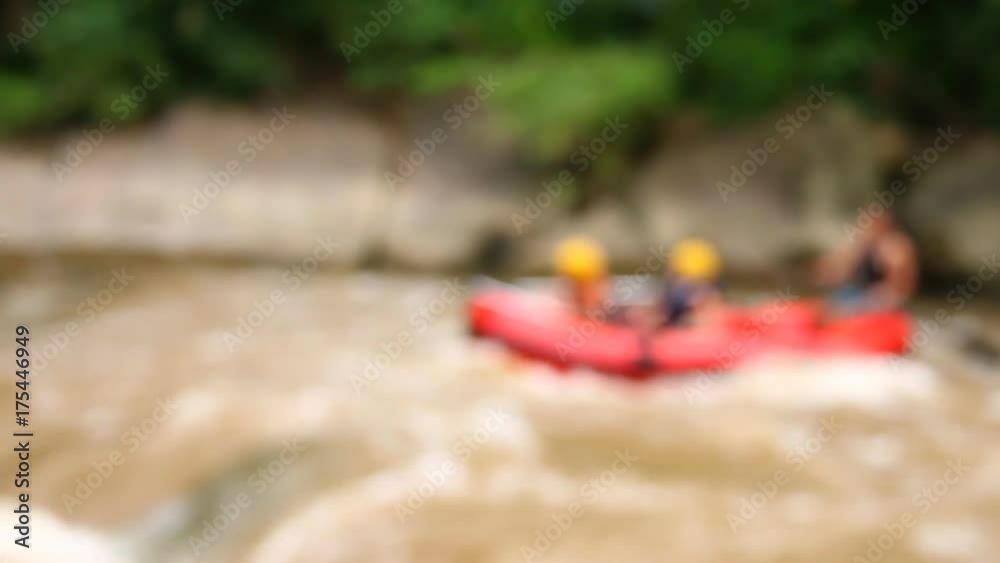 Blurred Group of tourist rafting on river in chiangmai Thailand Blurred Group of tourist rafting on river in chiangmai Thailand