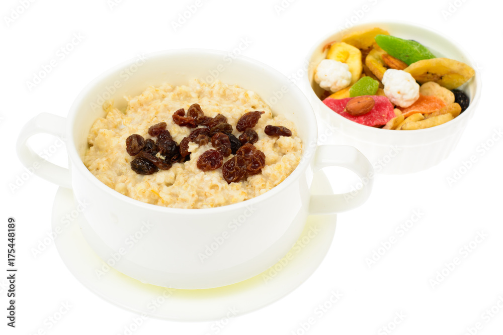 Health and Fitness food. Oatmeal porridge with berries and dried fruits Health and Fitness food. Oatmeal porridge with berries and dried fruits