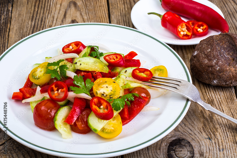 Spicy salad of fresh vegetables with chili Spicy salad of fresh vegetables with chili