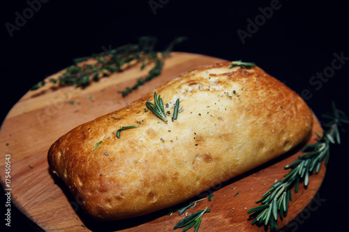 Traditional Italian ciabatta bread with herbs.