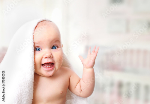 Baby in towel.