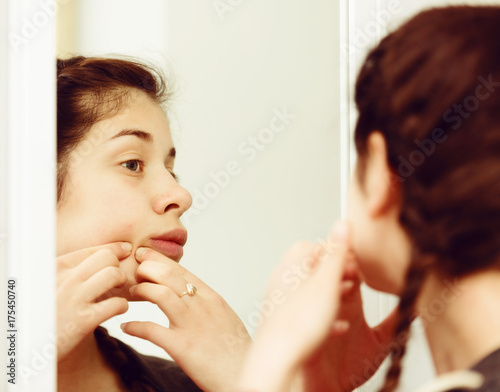 Girl cleaning pores