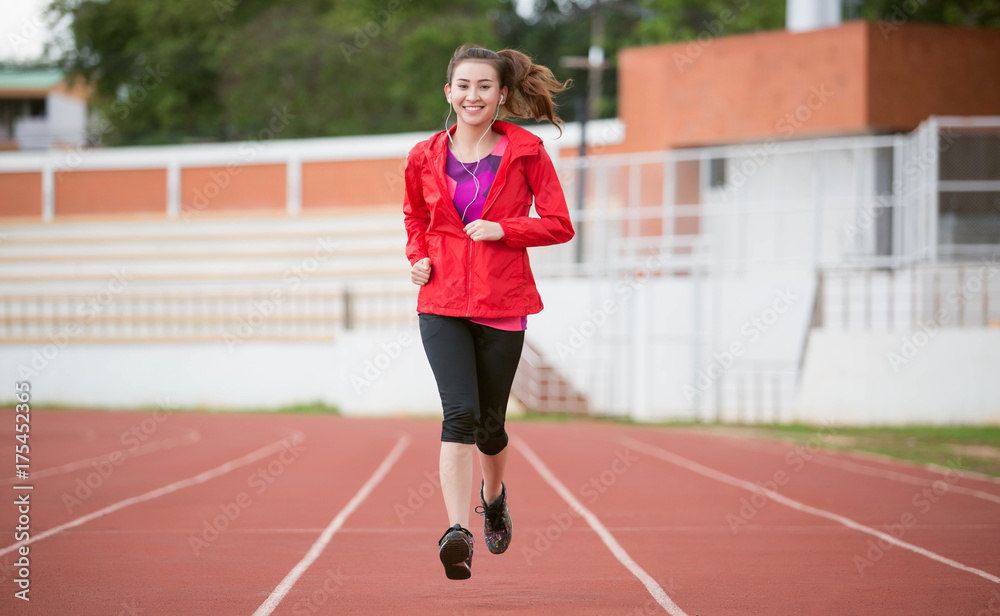 Fototapeta premium Asia woman runner during running exercise