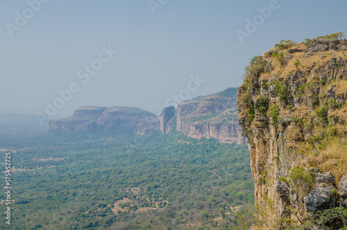 Landscape shot of beautiful Doucki Canyon in the Fouta Djalon highlands during Harmattan season, Guinea, West Africa photo