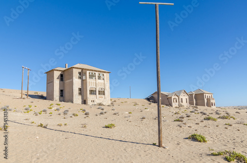 Ruins of once prosperous German mining town Kolmanskop in the Namib desert near Luderitz  Namibia  Southern Africa