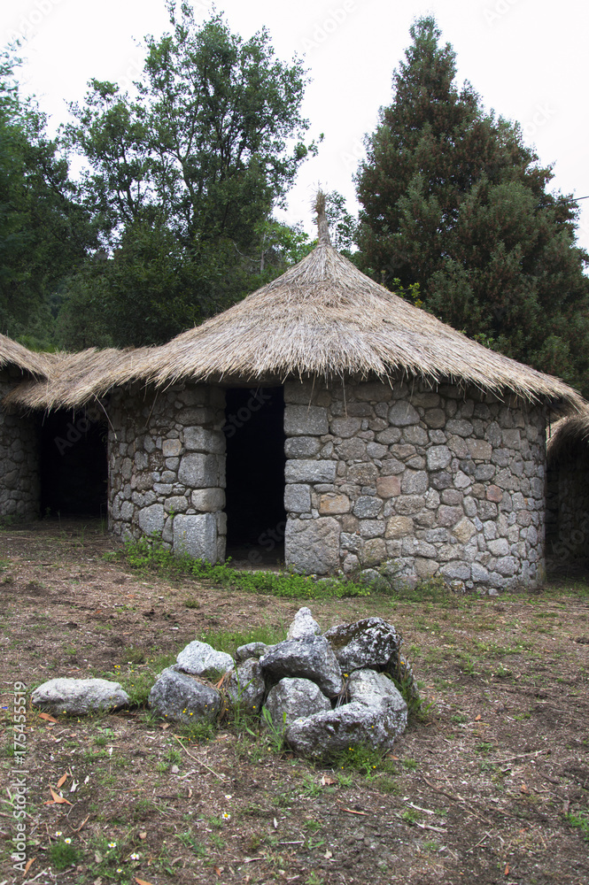 Bronze Age Celtic castro hillfort House recreation in Castro de Lanhoso,  Portugal with a stone campfire Stock Photo | Adobe Stock