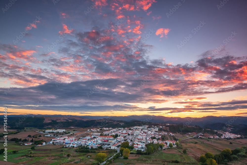 Fototapeta premium Aerial. Magical sunrise over the village of Aljezur.