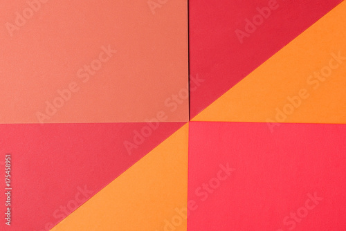 Abstract colorful paper background texture from red, orange.