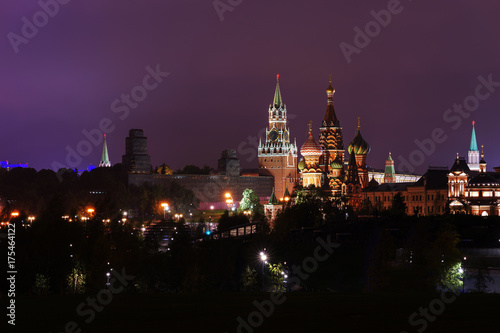 Night Moscow city and Kremlin under dark violet sky