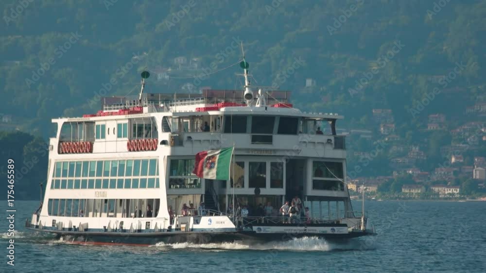 Tourist boat near Stresa. People travelling by water. Tourist boat near Stresa. People travelling by water.