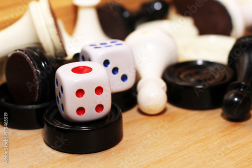 A pair white of dice and chess photo