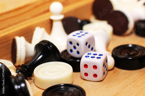 A pair white of dice and chess photo