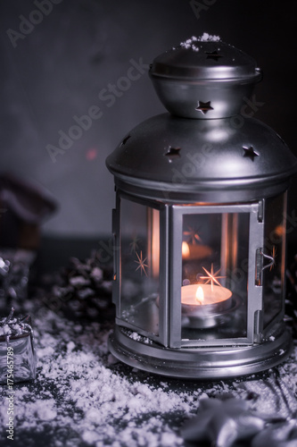Christmas lantern with decorations on gray background