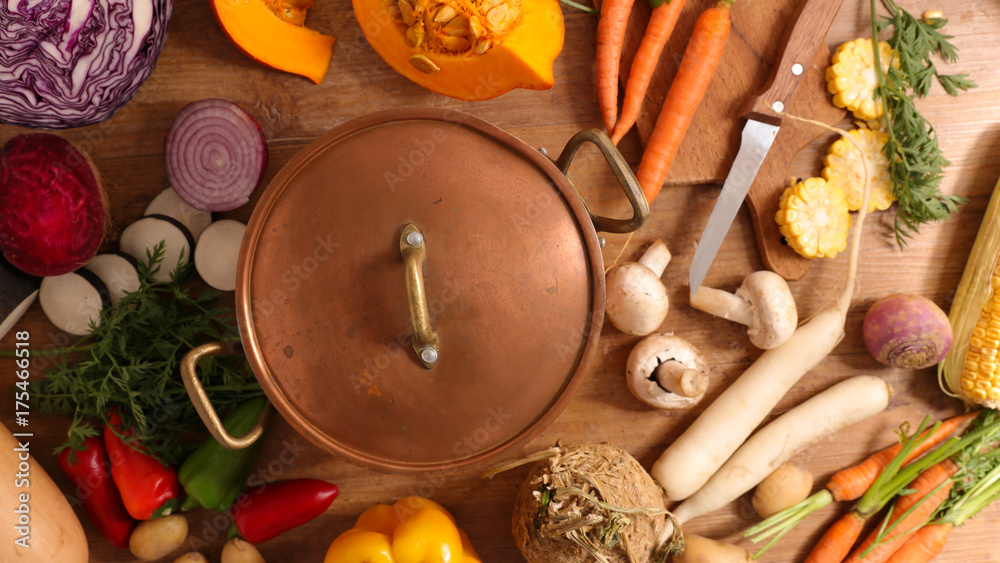 homemade soup, cooking pan with raw vegetables