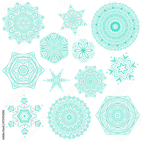 Set of creative and artistic blue and pink mandalas isolated on white background. Collection of mehendi tattoo designs. Beautiful and creative floral ornaments. Abstract decorative snowflakes.