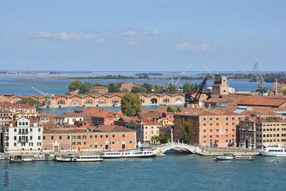 The view from the top of the bellltower of San Giorgio Maggiore church in Venice showing the Arsenale and the Torre di Arsenale
