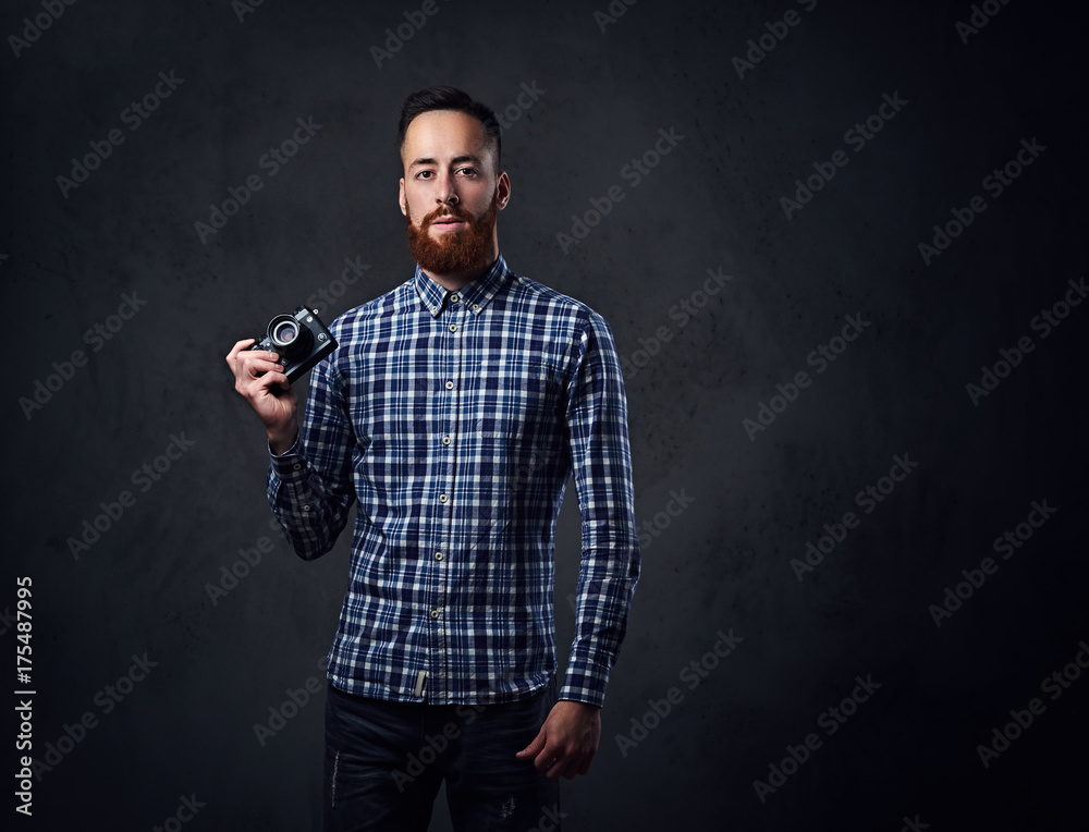 A man taking pictures with a compact camera. A man taking pictures with a compact camera.