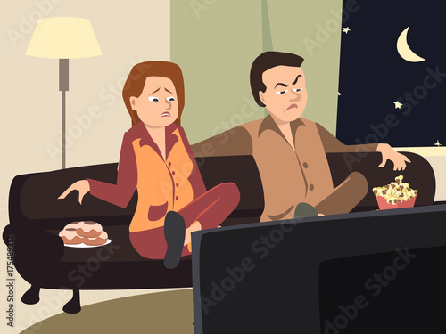 couple watching tv with different emotions