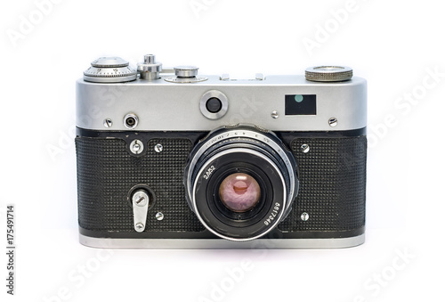 Analog soviet camera FED isolated on white background. Old dusty retro film photographic equipment.