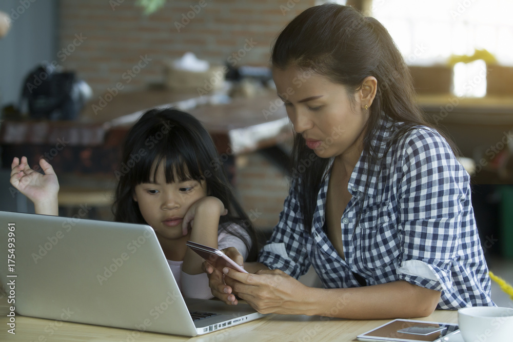 asia woman smailing using smart phone in coffee shop,technology communication lifestyle concept asia woman smailing using smart phone in coffee shop,technology communication lifestyle concept