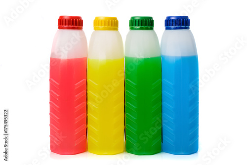 Automotive antifreeze bottles. Isolated on white background photo