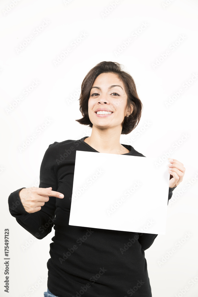 Beautiful young woman holding a blank sheet of paper Beautiful young woman holding a blank sheet of paper