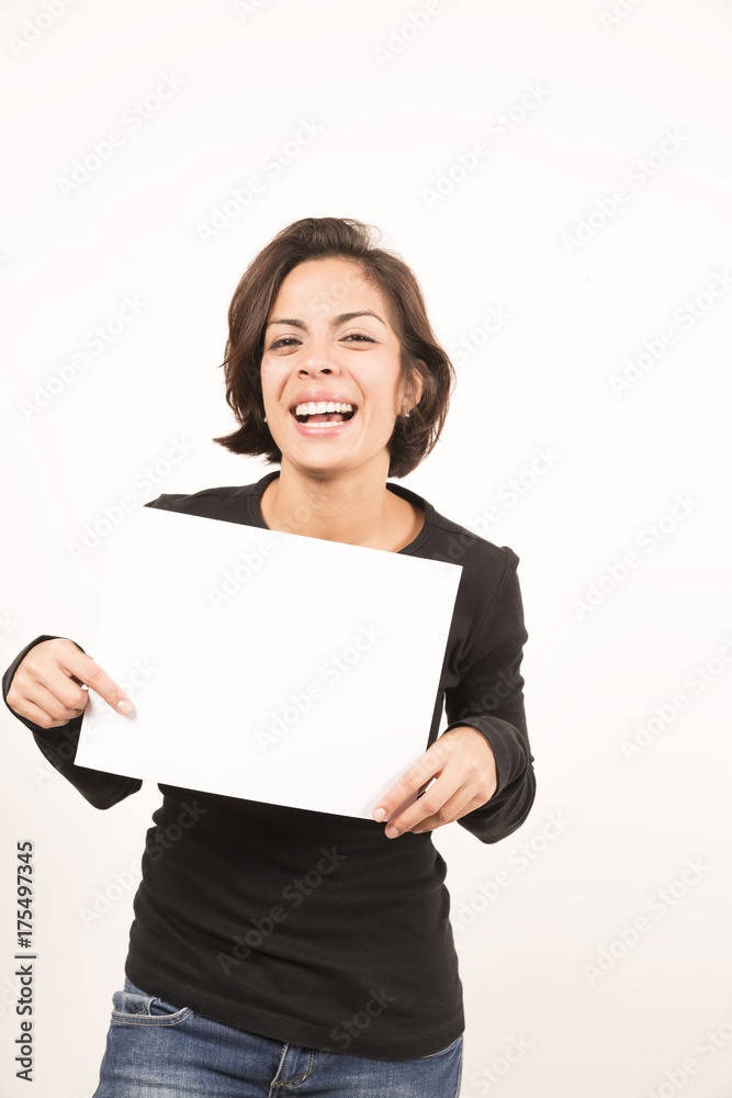 Beautiful young woman holding a blank sheet of paper Beautiful young woman holding a blank sheet of paper