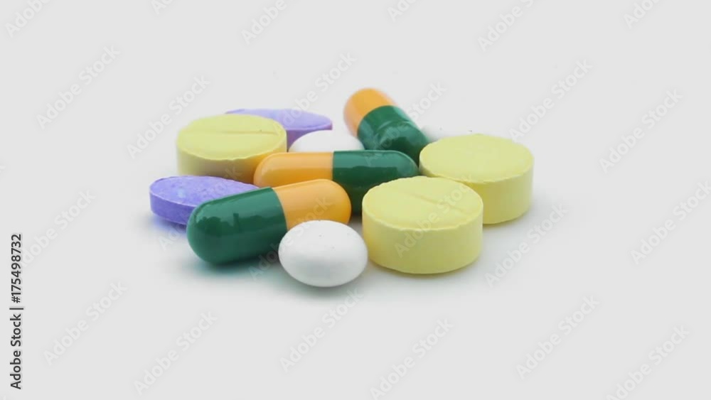 pills rotating on isolated white pills rotating on isolated white