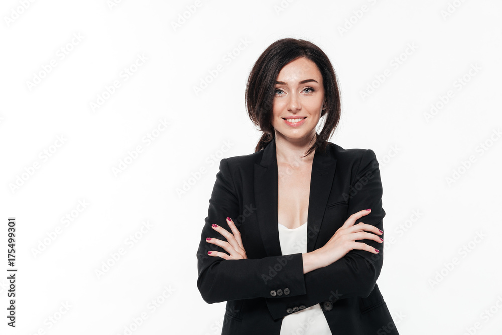 Portrait of a beautiful smiling businesswoman in a suit posing Portrait of a beautiful smiling businesswoman in a suit posing