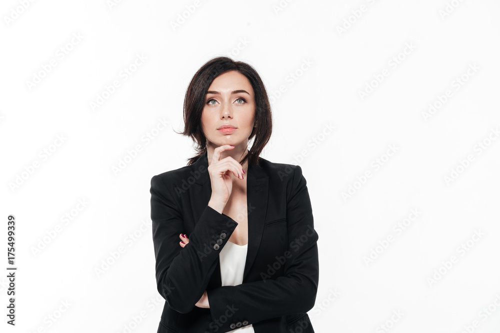 Portrait of a pretty thoughtful businesswoman in suit Portrait of a pretty thoughtful businesswoman in suit