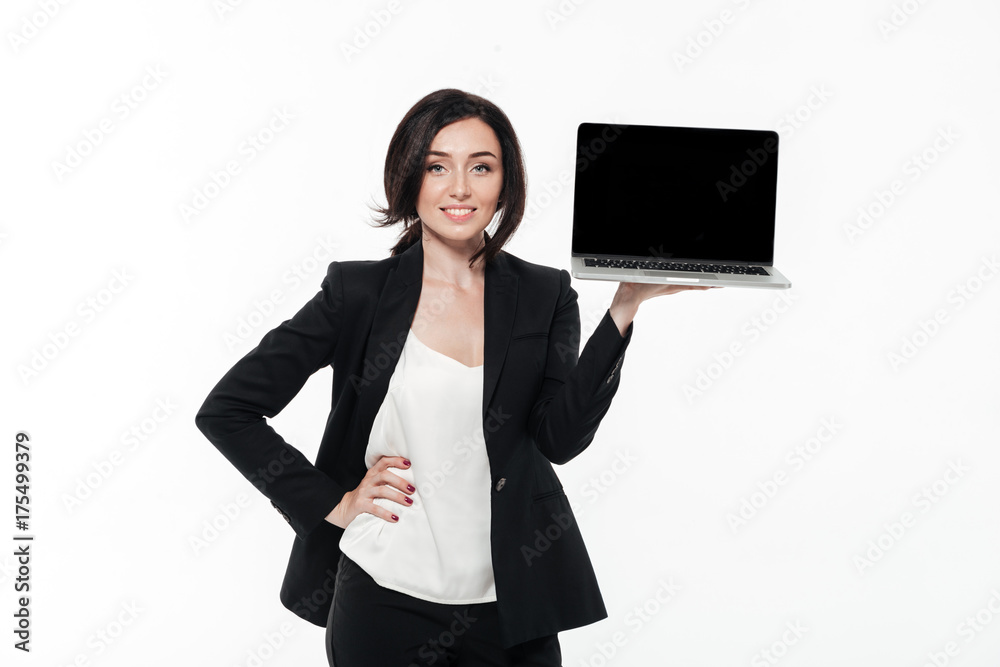 Portrait of a smiling brunette businesswoman in a suit Portrait of a smiling brunette businesswoman in a suit