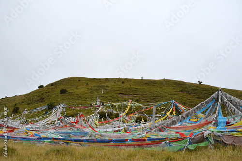 The prayer flags around the mountain behind Serti Gompa Monastery, in Langmusi - Amdo Tibet
