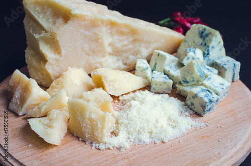 Grated Parmesan and sliced Blue cheese photo