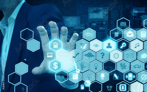 businessman holding technology