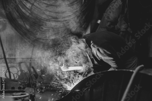 Metal Welding with sparks and smoke photo