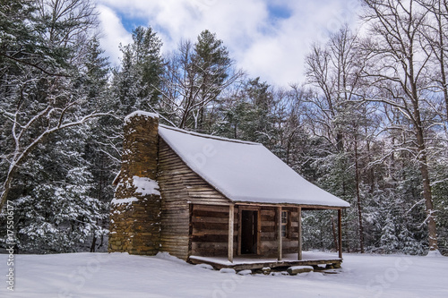 A historic cabin in the snow at Smoky Mtn Nat'l Park's Cades Cove