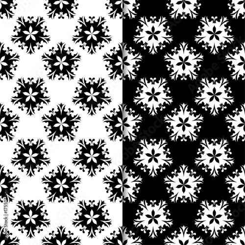 Fototapeta Naklejka Na Ścianę i Meble -  Black and white floral ornaments. Set of seamless backgrounds