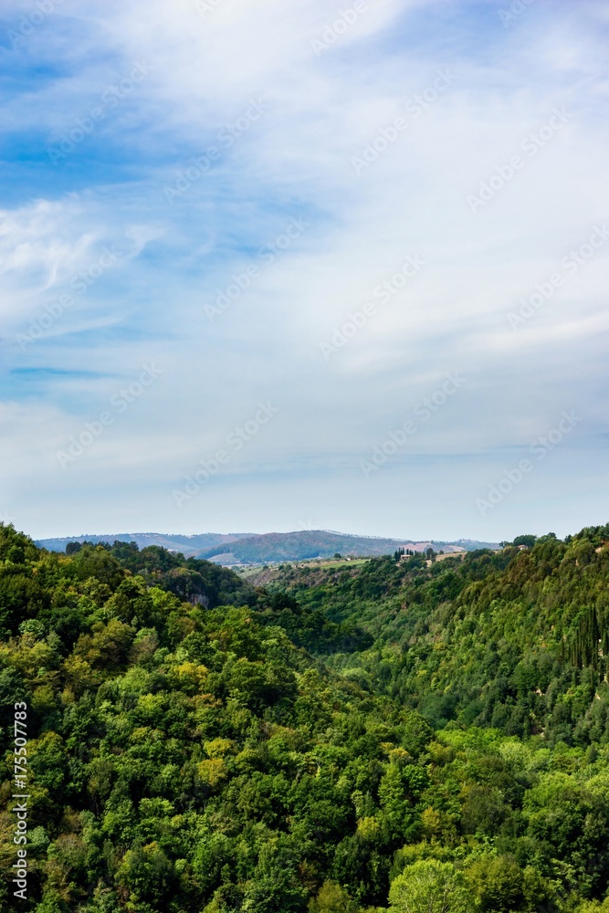 Walley between two hills covered by trees in Tuscany Walley between two hills covered by trees in Tuscany